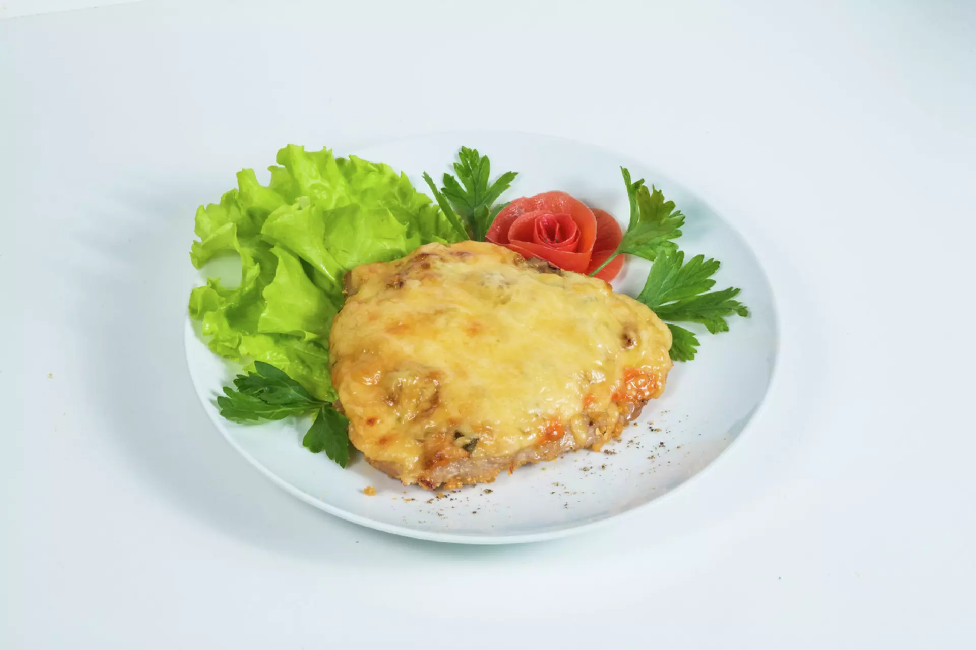 Отбивная свиная под сырным соусом